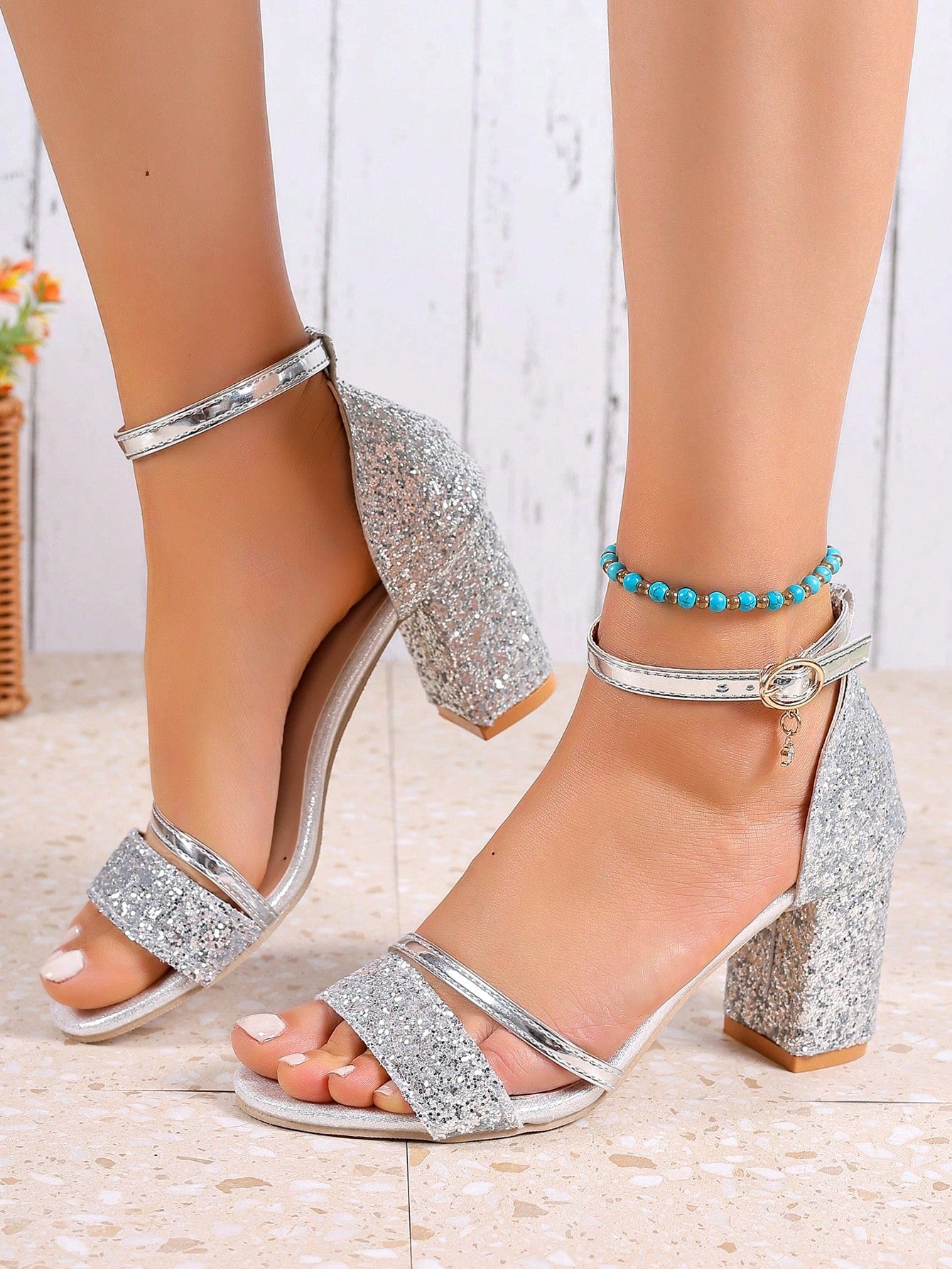 Step into style and comfort with our Chic Open-Toe Chunky Low Heel Sandals! These sandals feature a trendy open-toe design and a sturdy yet comfortable low heel. Perfect for any occasion, from parties to daily wear, these ankle strap shoes will elevate any outfit.