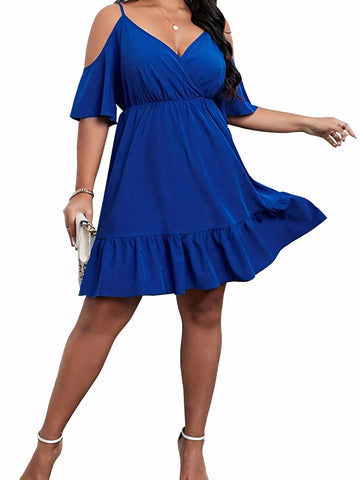 Stay effortlessly chic with our oversized cold shoulder dress. The elegant V-neck and waist belt add a touch of sophistication to this commuter style dress. Say goodbye to boring work attire and hello to stylish comfort.