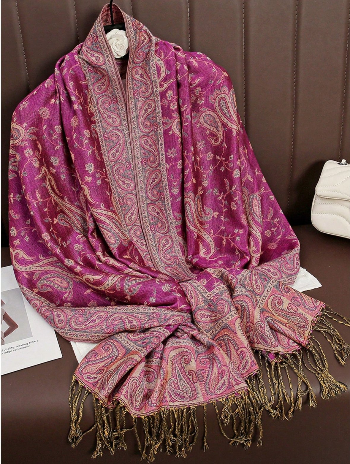 Elevate your style with our Chic Paisley Jacquard Scarf. Made from high-quality material, this scarf features a beautiful paisley pattern and delicate fringe details. Its versatile design allows you to effortlessly pair it with any outfit, making it the perfect accessory for any occasion. Add a touch of sophistication to your wardrobe with this must-have piece.