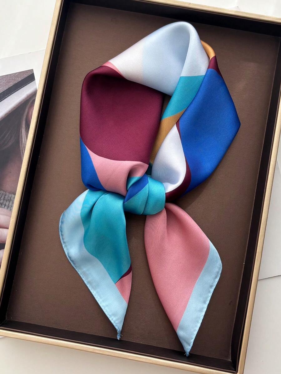 Elevate your accessory game with this luxurious satin square scarf, featuring an elegant paisley print that complements any outfit. Crafted from smooth, lustrous satin fabric, this versatile wrap drapes beautifully around your neck, ties as a chic headscarf, or styles as a sophisticated bag accent. The timeless paisley pattern adds a touch of refined elegance to casual and formal looks alike. Perfect for layering, sun protection, or making a bold fashion statement. 