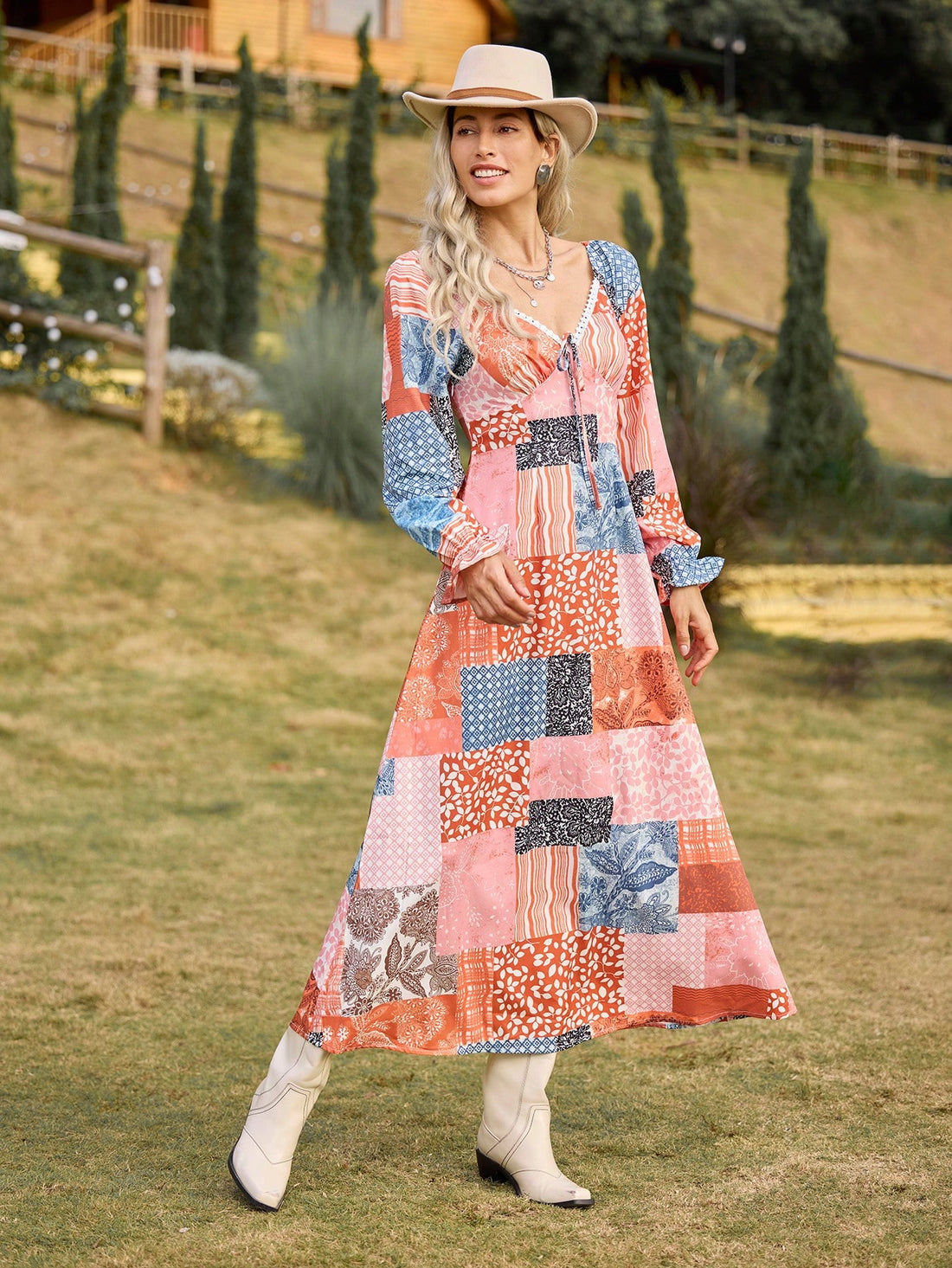 This dress may look like a patchwork quilt at first glance, but it's actually a chic and playful maxi dress perfect for effortless vacation style. With its unique print and flowy fit, you'll be sure to turn heads and feel comfortable all day. Perfect for your next beach getaway!