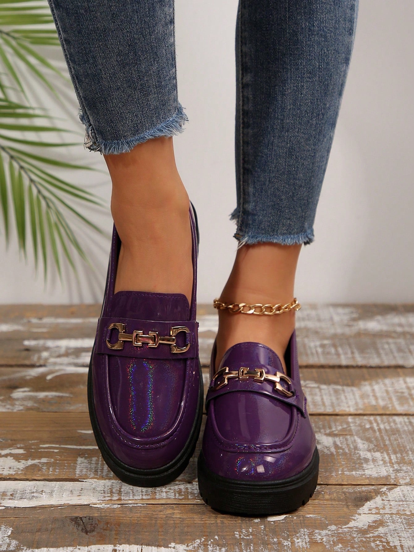 These chic patent loafers are perfect for all seasons with their thick sole and metal chain accent. Slip them on for a stylish look that will elevate any outfit. Who needs heels when you have these perfect year-round flats? (And they're patent, so they'll always look shiny and new!)