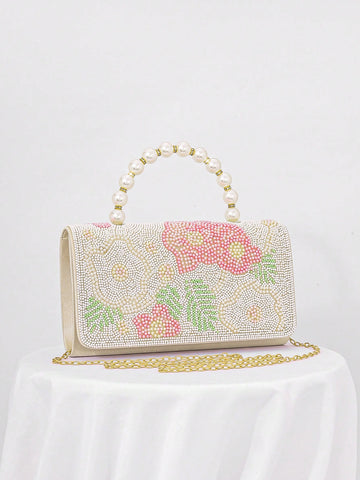 Add a touch of whimsy to your evening look with this Chic Pearl Flower Print Evening Clutch. Its delicate pearl flower design brings a playful charm while keeping things elegant, perfect for turning heads at formal events and celebrations. Compact yet roomy enough for your essentials, this clutch is your new go-to for stylish nights out.