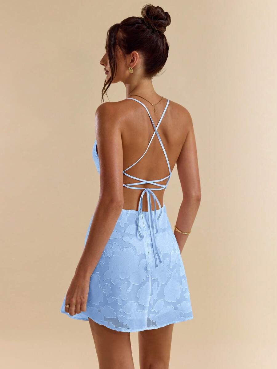 Elevate your spring and summer wardrobe with this stunning pink A-line mini dress. Featuring a flattering scoop neckline, delicate tie straps, and a backless design, it's the perfect choice for celebrations, night outs, and special occasions. The lined, non-stretch woven polyester construction ensures a polished look, while the high-waisted silhouette and flared hem create a chic, feminine silhouette. Easy to care for with machine wash or professional dry cleaning. Make a statement at your next event.