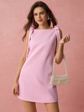 Get chic this summer with our Pink Bow Sleeveless Mini Dress! Perfect for romantic outings and special occasions, this dress features a flirty bow detail that adds a touch of whimsy. So why not add a little romance to your wardrobe? (And a little quirkiness too!)