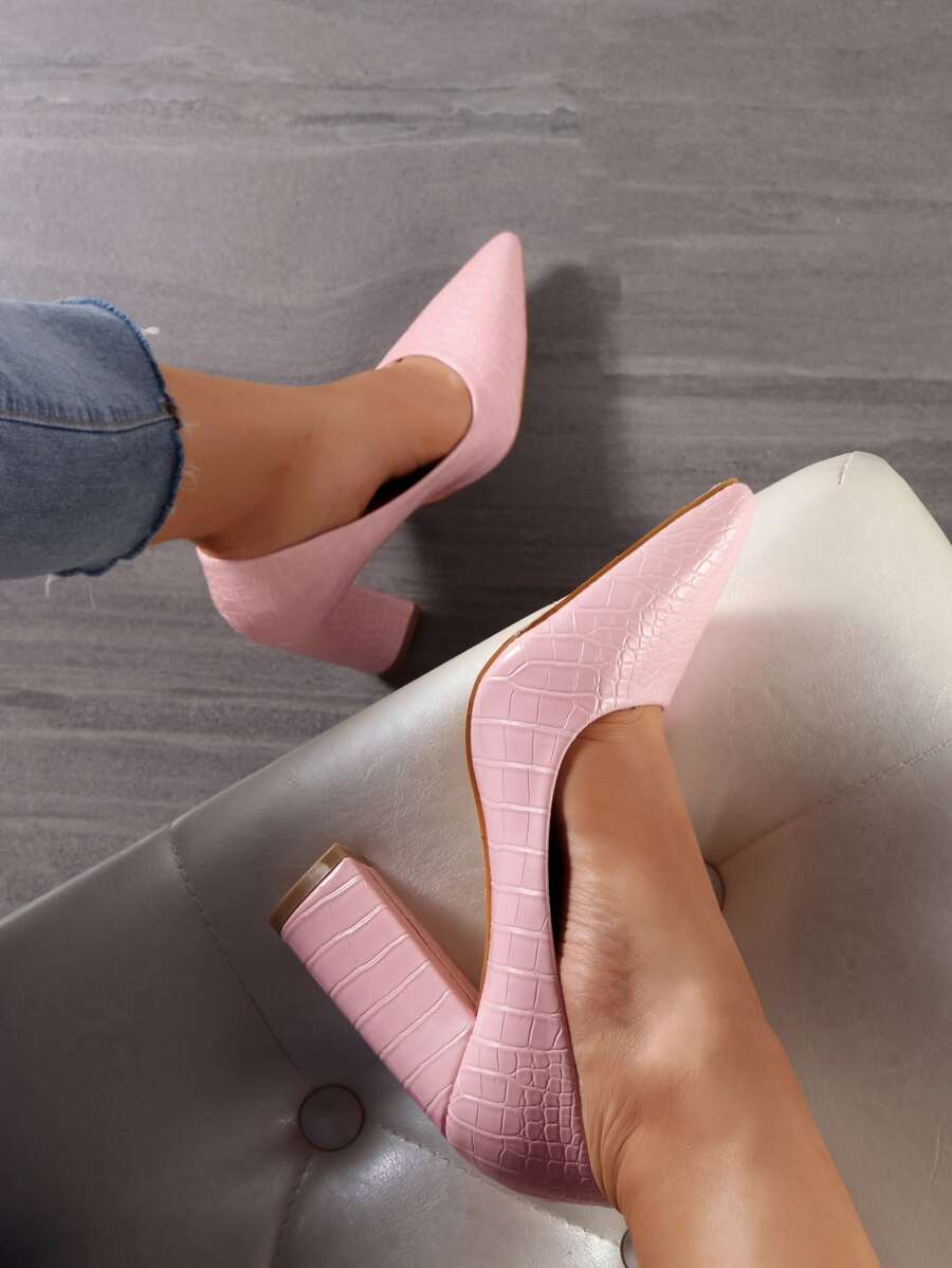 Elevate your seasonal wardrobe with these stunning pink court pumps, featuring a sophisticated crocodile embossed texture that adds visual interest to any outfit. The chunky heel provides all-day comfort and stability, while the pointed toe creates an elegant silhouette perfect for fall and winter occasions. Crafted from premium PU leather with matching lining, these slip-on pumps deliver a polished look whether you're heading to work, special events, or casual outings. True to size and designed for effortl