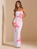 Make a statement in this eye-catching pink floral strapless dress! Perfect for beach vacations or summer parties, this fitted silhouette hugs your curves in all the right places. The vibrant pattern turns heads while the strapless design keeps you cool during sunny adventures. Dance the night away or sip cocktails by the shore – this versatile piece is ready for whatever fun comes your way!