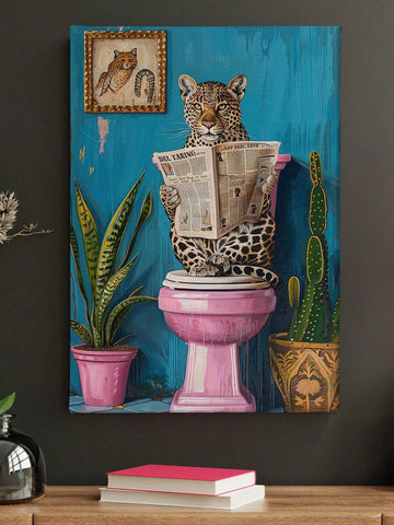 Unframed leopard canvas wall art showing spotted leopard reading a newspaper on a pink toilet with teal wall and plants