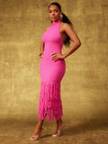 Turn heads in this stunning pink halter neck midi dress that perfectly blends sophistication with fun. The open back design adds an unexpected flirty touch, while the soft knit fabric hugs you in all the right places. Topped off with a playful fluted fringe hem that dances with every step, this dress is your go-to for date nights, parties, or whenever you want to feel absolutely fabulous. Effortlessly chic and undeniably eye-catching.