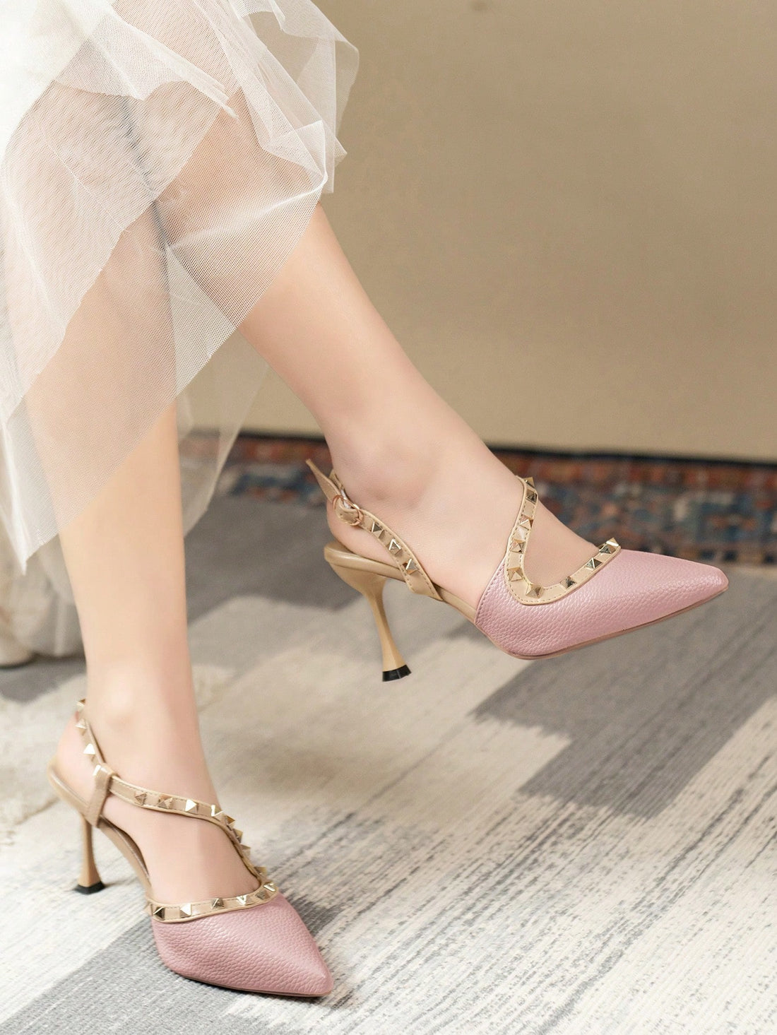 Step into the ultimate party shoe - our Chic Pink High Heel Sandals! These strappy stilettos add a touch of charm to any summer occasion, with a rivet toe cap for added style. Perfect for dancing the night away or standing out at a special event.