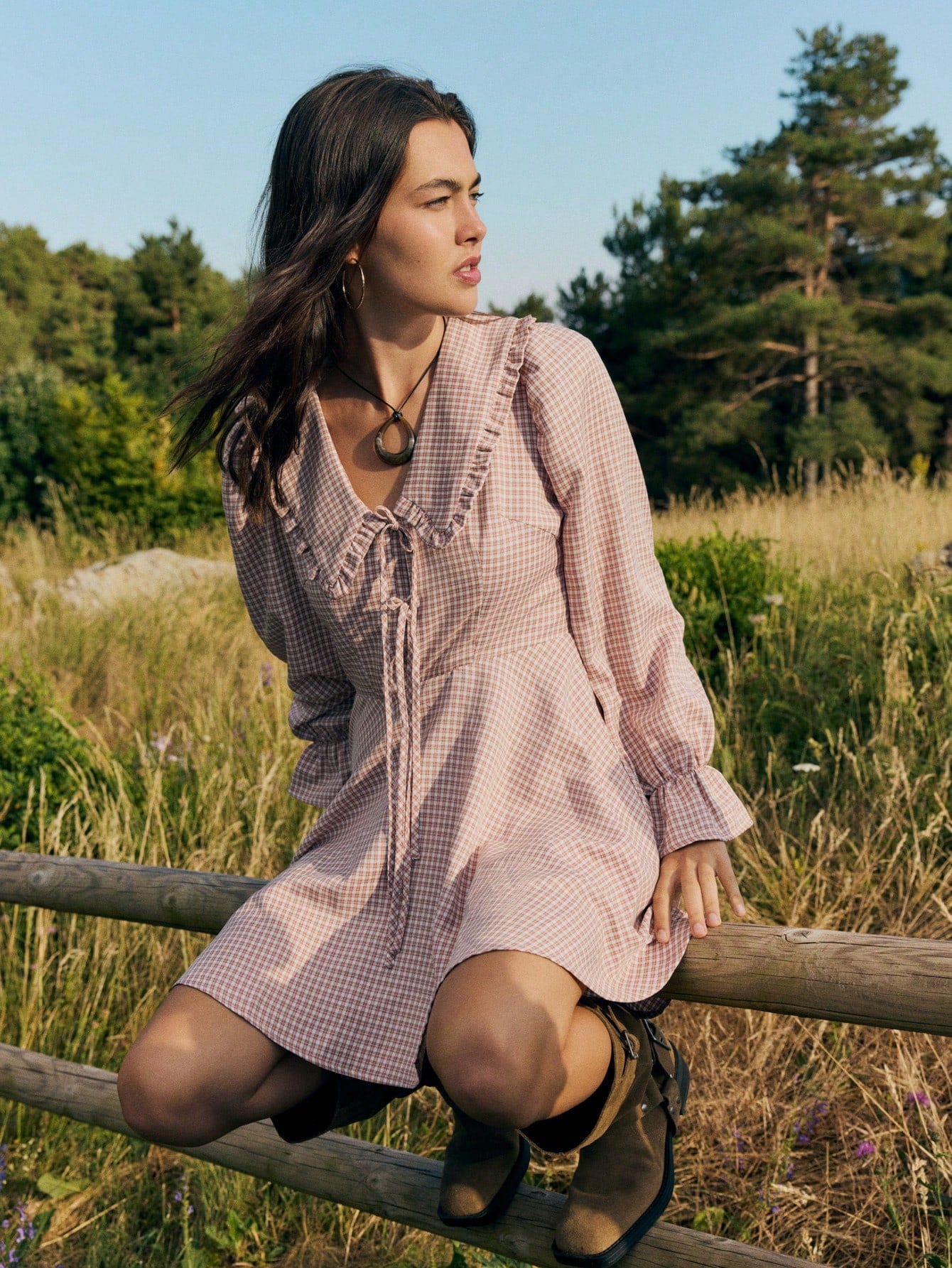 Elevate your wardrobe with this charming pink long sleeve dress that's as versatile as it is adorable! The ruffled hem adds a playful touch of texture, while the tie front creates a flattering silhouette that works for any occasion. Whether you're heading back to school, embracing fall fashion, or looking for a polished teacher outfit that doesn't sacrifice style, this dress delivers effortless elegance. Soft, comfortable, and undeniably chic—it's the piece you'll reach for again and again.