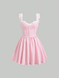 Step out in style with this Chic Pink Plaid Dress, featuring delicate lace trim and flirty spaghetti straps. Its French-inspired A-line silhouette flatters every figure, making it perfect for modern women who love a playful yet elegant look. Whether you're brunching with friends or enjoying a sunny day out, this dress adds a touch of charm and fun to your wardrobe.