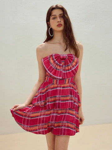 Step out in playful charm with this Chic Plaid Bow Decor Tube Puffball Dress. Featuring a fun puffball silhouette and a stylish plaid pattern accented by a cute bow, it’s perfect for adding effortless flair to your wardrobe. Whether for a casual day out or a lively gathering, this dress brings a touch of whimsy and comfort to your look.