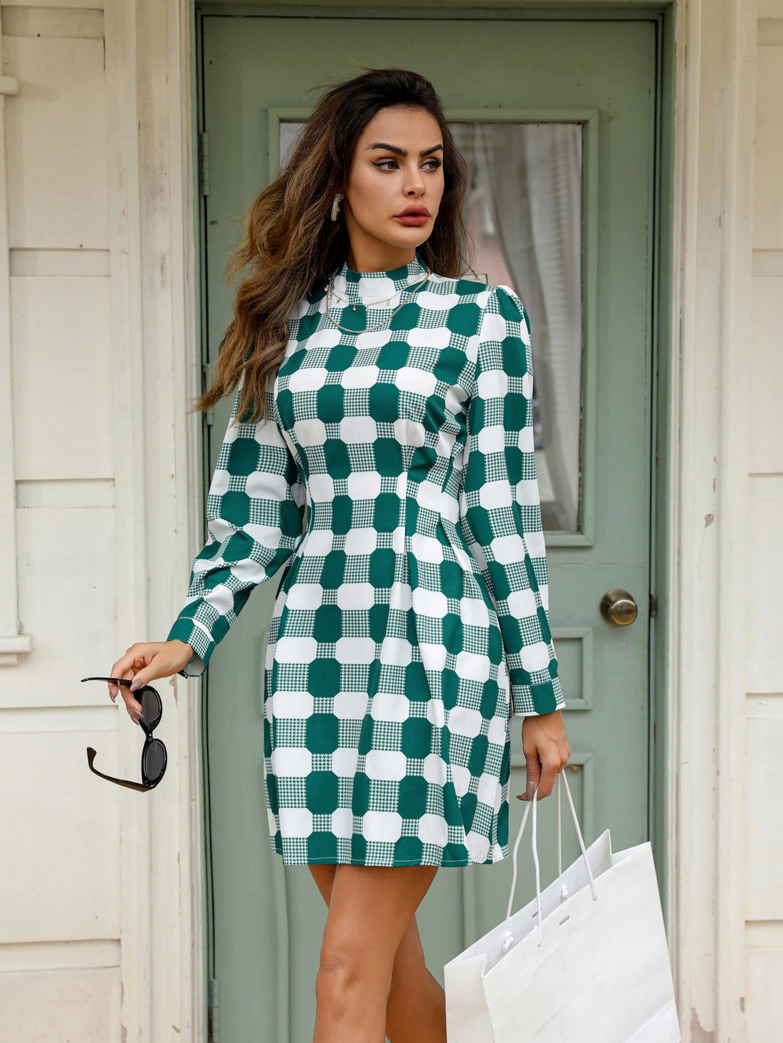 This chic plaid long sleeve dress effortlessly combines style and versatility, making it perfect for any occasion. With its timeless plaid pattern and comfortable design, this dress will elevate your look while keeping you comfortable and confident. Perfect for any fashion-forward individual looking to make a statement.
