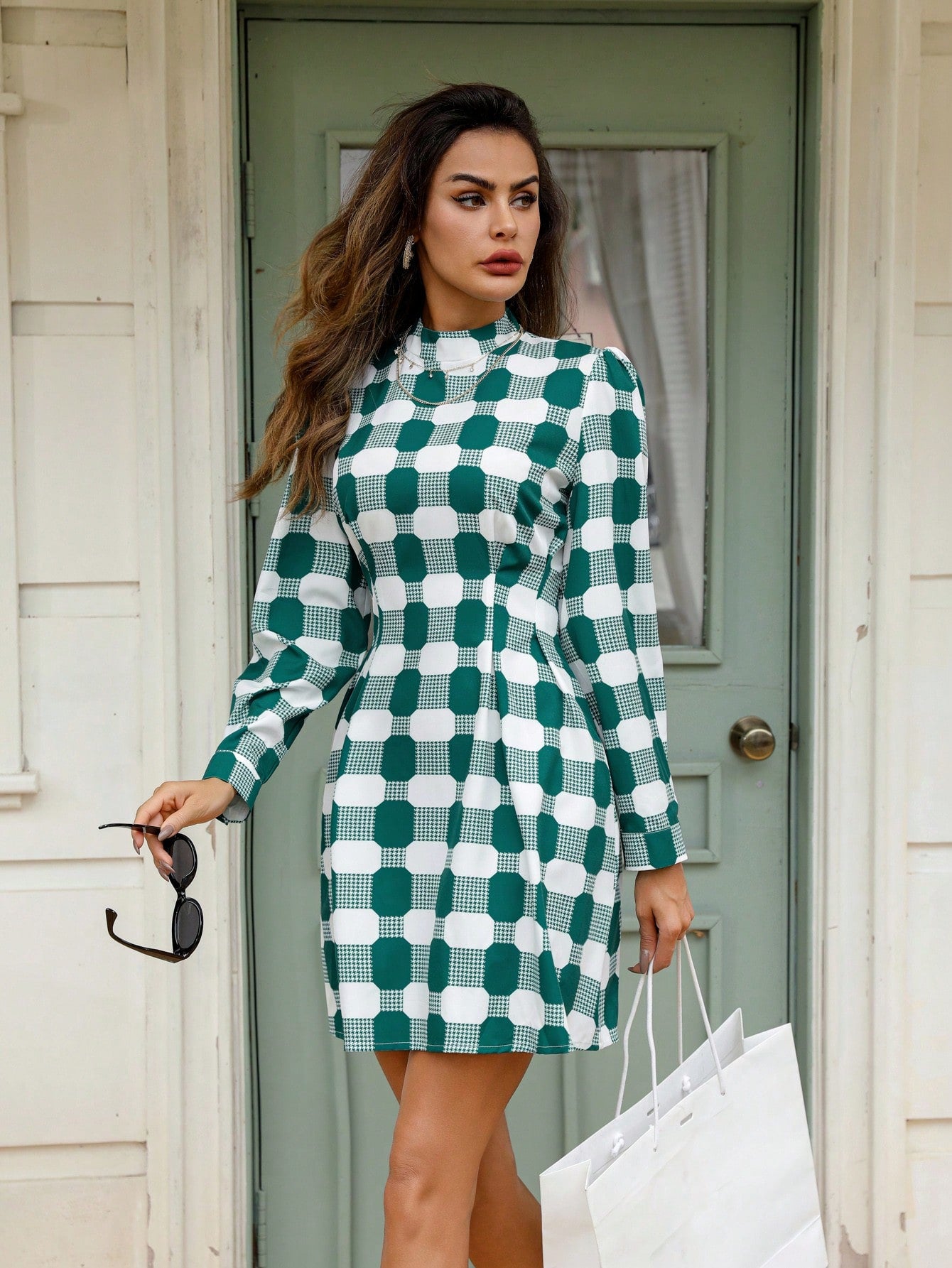 This chic plaid long sleeve dress effortlessly combines style and versatility, making it perfect for any occasion. With its timeless plaid pattern and comfortable design, this dress will elevate your look while keeping you comfortable and confident. Perfect for any fashion-forward individual looking to make a statement.