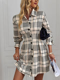 Experience effortless style with our Chic Plaid Print Button-Front Shirt Dress. Crafted with a chic plaid print, this dress exudes timeless elegance. The button-front design adds a touch of sophistication, making it perfect for any occasion. Elevate your wardrobe with this versatile and effortlessly stylish piece.