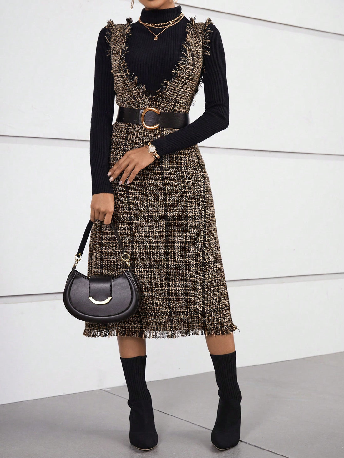 Effortlessly elevate your style with our Chic Plaid Print Overall Dress. Featuring a unique raw trim, this dress is perfect for any occasion. The classic plaid print adds a touch of sophistication, while the overall design provides a versatile and stylish look. Perfect for the fashion-forward individual.