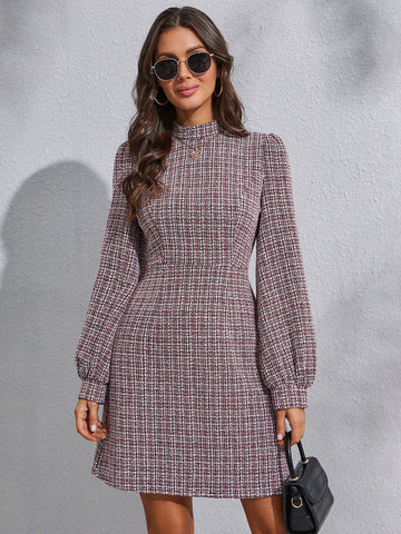 Elevate your style with our chic plaid tweed dress, featuring lantern sleeves for a touch of sophistication. Made with high-quality materials, this dress offers a perfect balance of comfort and style. Perfect for any occasion, this dress will take your fashion game to the next level.