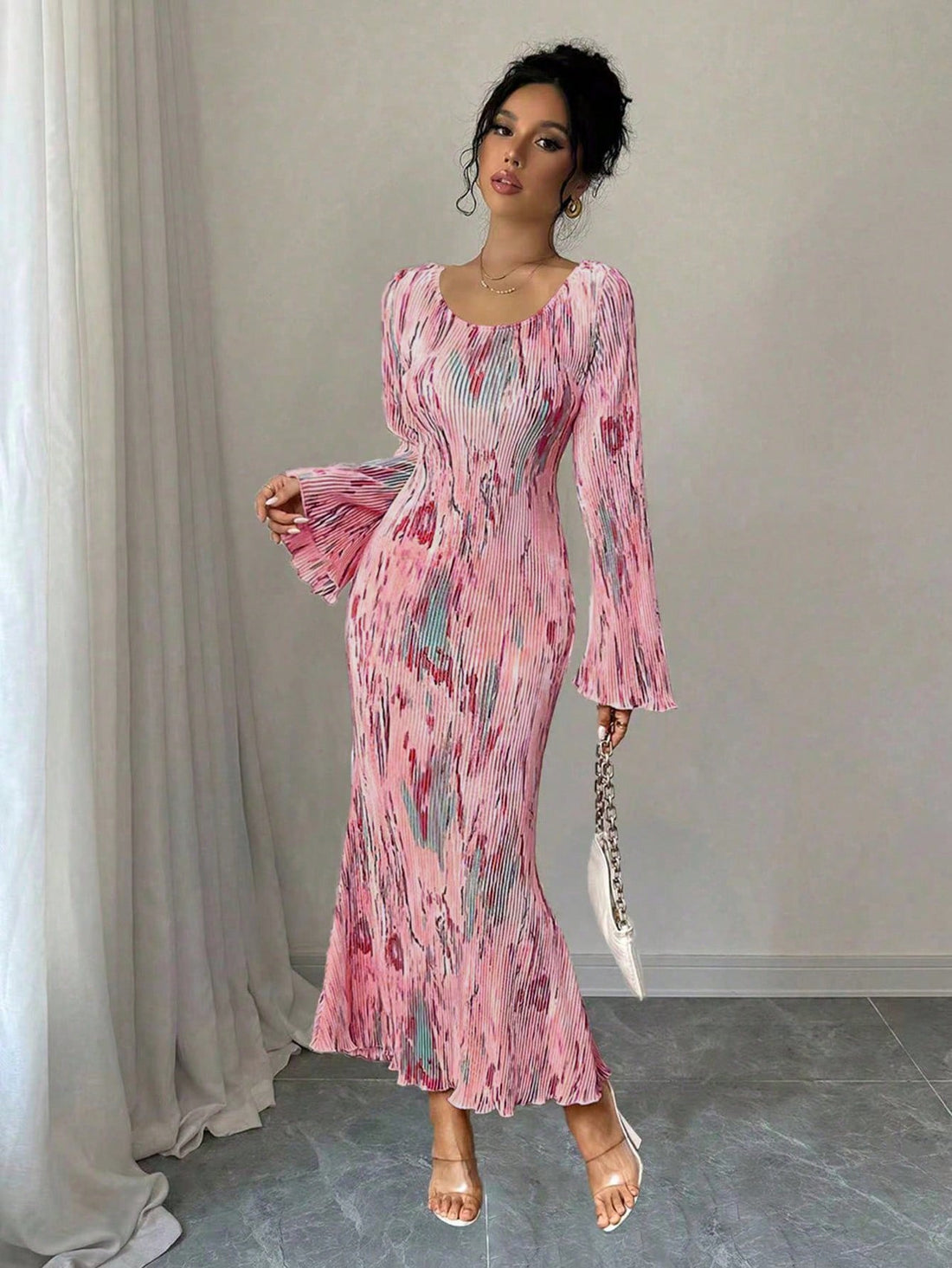 Add a touch of effortless elegance to any occasion with our Chic Pleated Acid Wash High-Low Hem Maxi Dress. Featuring a unique acid wash design and pleated details, this dress offers a playful and stylish look. Perfect for any event, this dress will be sure to make a statement!