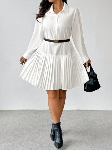 Effortlessly elevate your style with our Chic Pleated Hem Plus Size Button-Up Long Sleeve Shirtdress. Featuring a pleated hem and button-up design, this dress is perfect for any occasion. Crafted to fit plus sizes, you can feel confident and comfortable while looking effortlessly fashionable. Upgrade your wardrobe with this timeless piece.