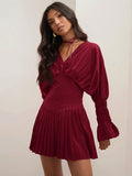 Elevate your fall wardrobe with our Chic Pleated Mini Dress! Featuring an elegant red v-neck and long sleeves, this dress is both stylish and comfortable. The pleats add a touch of sophistication while the mini length makes it perfect for any occasion. Embrace your inner fashionista and stand out in this must-have outfit!