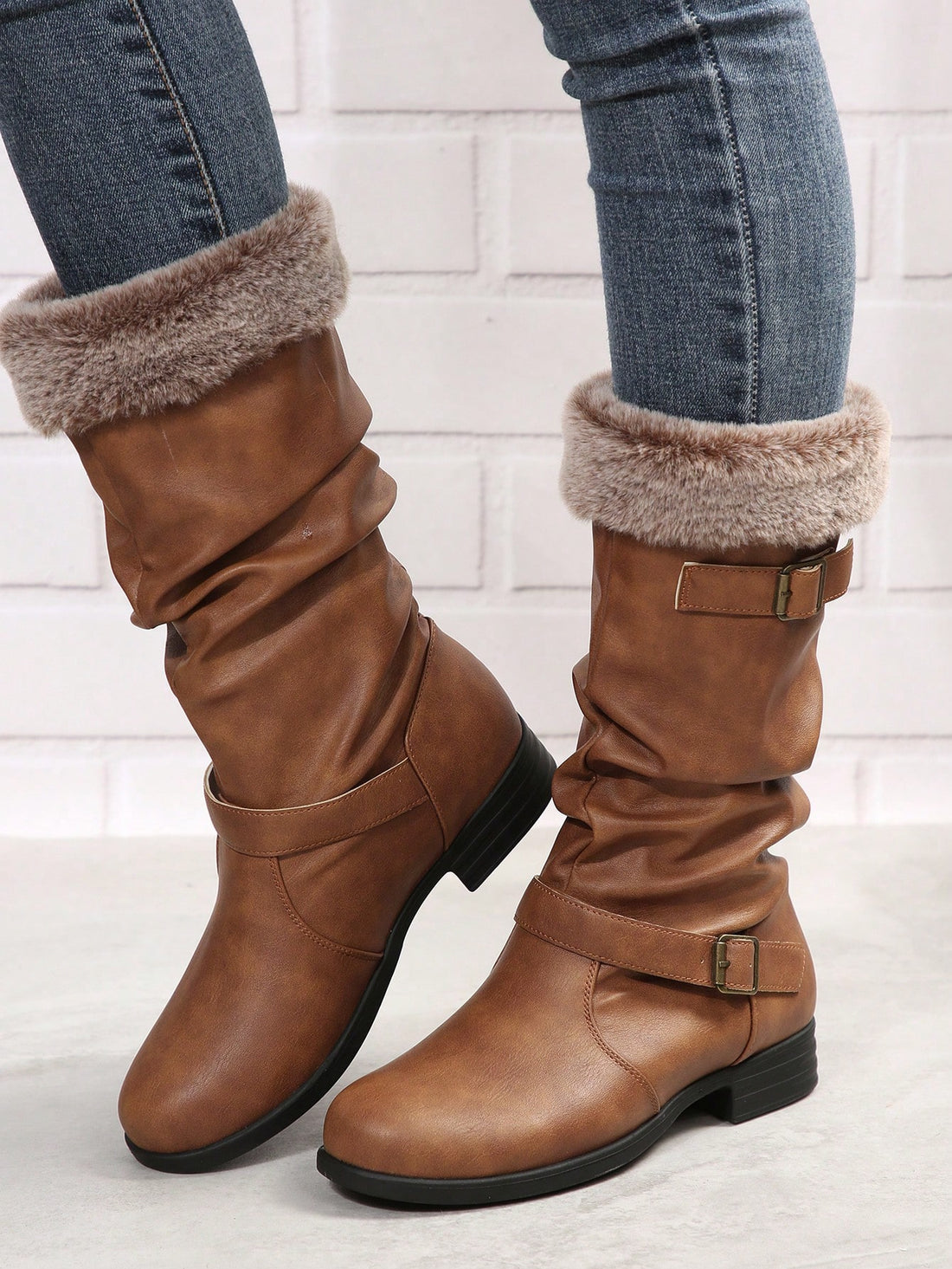 Upgrade your winter wardrobe with these trendy and cozy boots! The pleated over-the-knee design adds a touch of chic to any outfit, while the fluffy trim keeps you warm and comfortable. Perfect for plus size fashionistas, these boots are a winter essential that will elevate your style game.