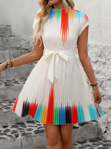 This dress effortlessly combines elegance and comfort with its chic pleated design and off-shoulder style. Featuring long sleeves and a printed pattern, it exudes effortless style and sophistication. Perfect for any occasion, this dress will elevate your wardrobe with its effortless elegance.