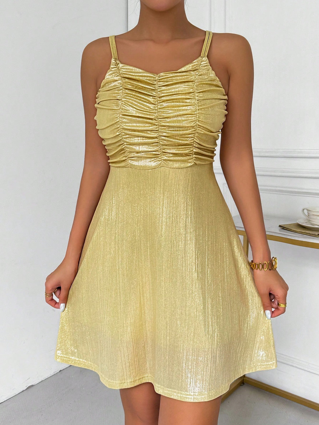 Get ready to turn heads with our Chic Pleated Strappy Dress! This dress effortlessly combines elegance and style, making it perfect for any occasion. The pleated design and strappy details add a touch of sophistication, while the comfortable fit guarantees you'll feel as good as you look. Dress to impress and feel confident in this versatile and chic dress.