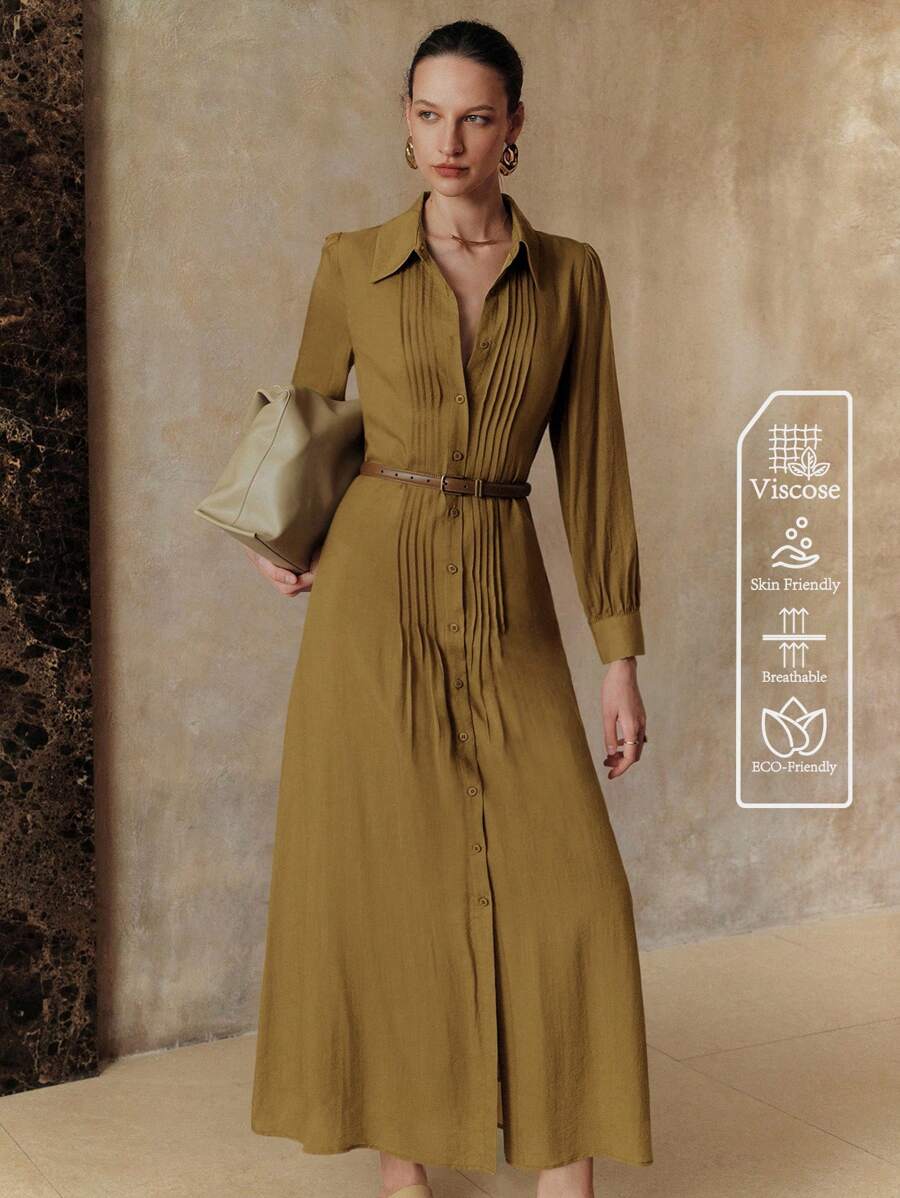 Elevate your seasonal wardrobe with this effortlessly chic pleated dress that's ready for anything. Crafted from breathable Tencel fabric, it features a flattering cinched waist that defines your silhouette while the button-down front adds a polished touch. The pleated design creates beautiful movement and dimension, making it perfect for breezy summer days or layered autumn looks. Versatile enough for casual outings or dressed-up occasions, this piece is your new go-to for looking put-together without tryi