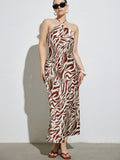Step into effortless style with this chic plus-size maxi dress featuring a bold colorblock zebra print. Perfect for casual holiday outings, its flowing silhouette offers comfort while making a striking statement. Embrace playful patterns and vibrant contrasts that celebrate your curves with confidence and flair.