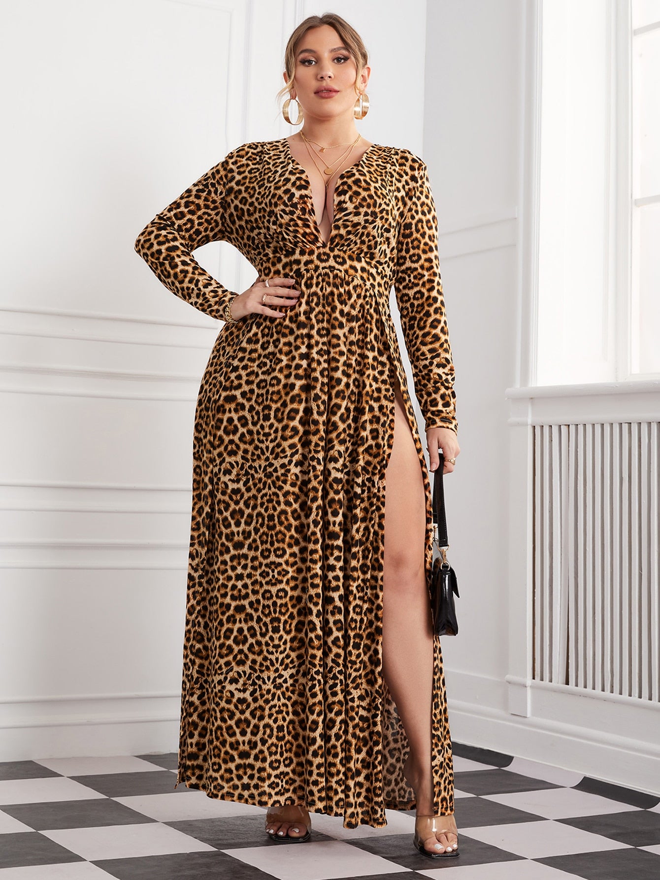 Unleash your fierce and confident style with our Chic Plus-Size Leopard Print Dress! With a plunging neckline and split thigh design, this dress will have heads turning. Dress it up for a night out or down for a day at the office. Embrace your inner wild side and make a statement with this bold and stylish dress!