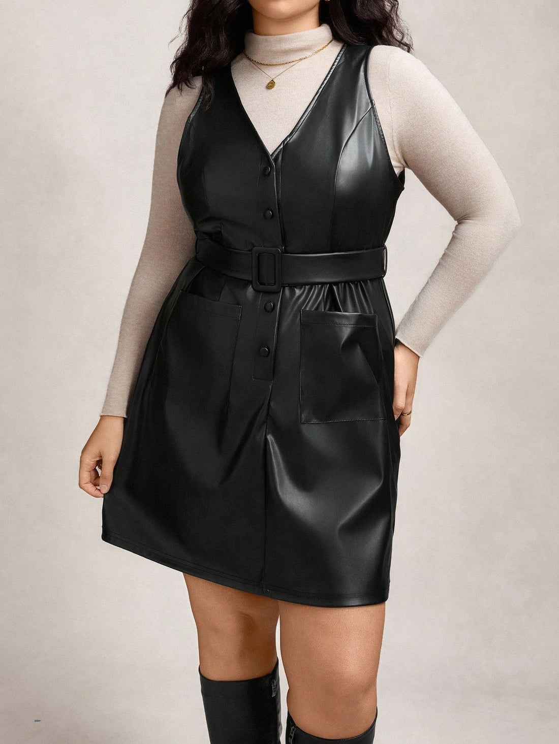 Turn heads with this Chic Plus-Size PU Leather Sleeveless Belted Dress! Designed for effortless style, it features a sleek belted waist to highlight your curves and handy pockets for a dash of practicality. Whether you're out for a casual day or a night on the town, this dress combines comfort and confidence in one fabulous look. Slip into something that’s as bold and playful as you are!