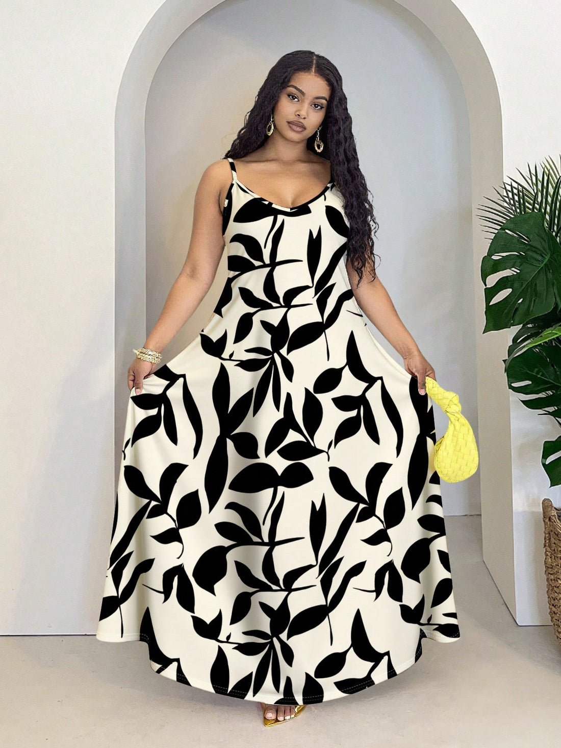 Step into vacation mode with this playful plus-size dress featuring a vibrant colorblock leaf print. Its flowy, sleeveless design keeps you cool and comfortable while adding effortless style to any outing. Perfect for sunny days and breezy evenings, this dress blends ease and charm in one flattering look.