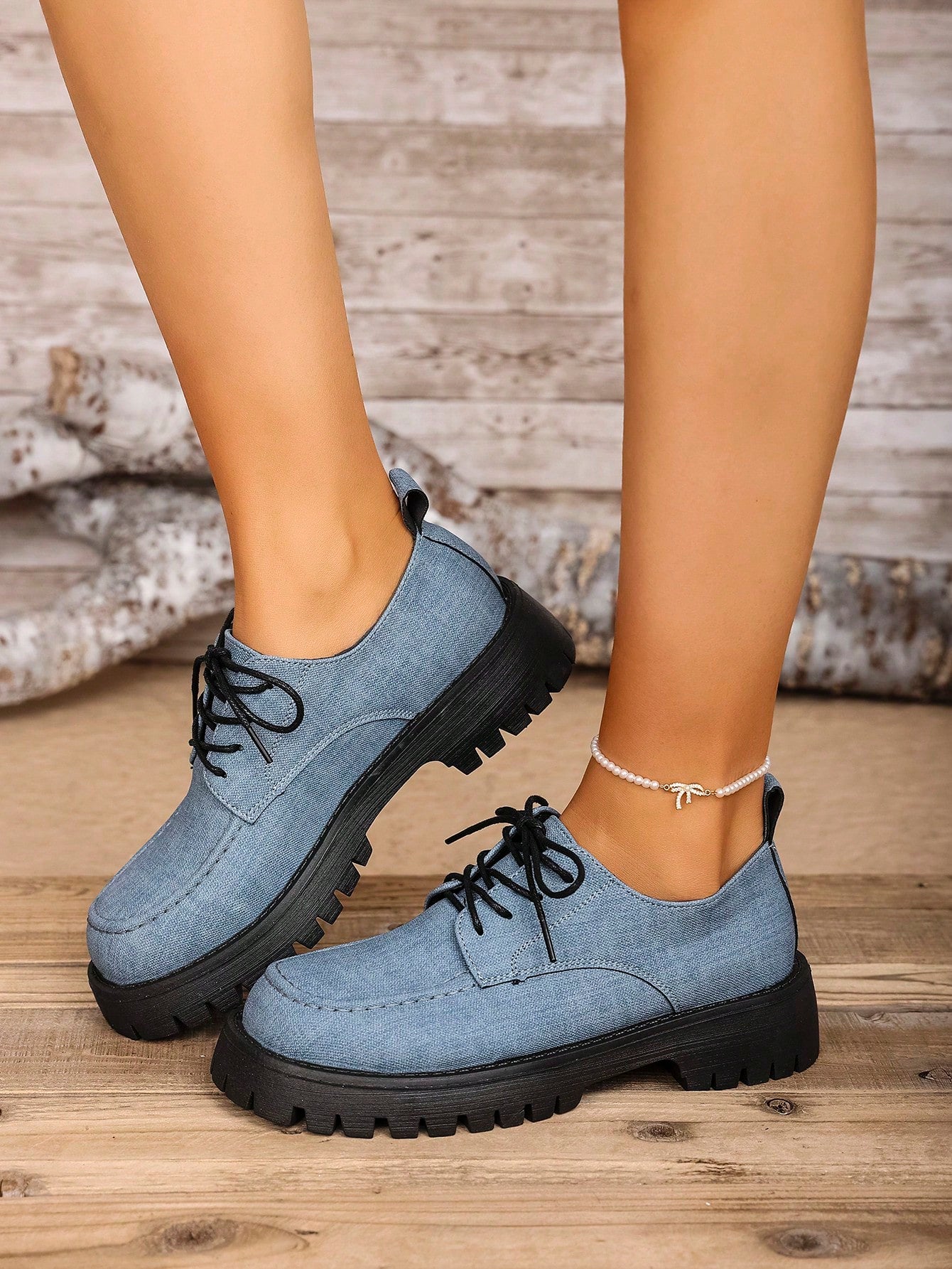 These chic plus-size black platform loafers are a fashionable take on British style. The thick sole and non-slip design provide comfort and stability. Upgrade your wardrobe with these quirky and stylish statement shoes!