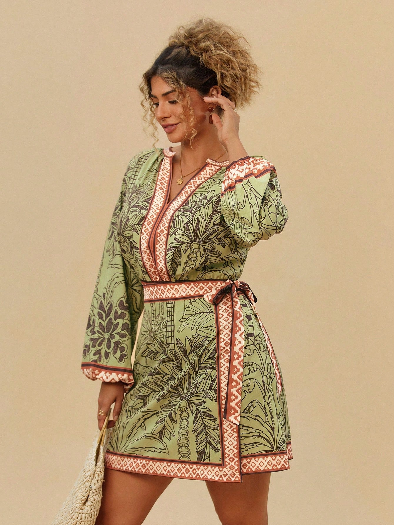 Get ready to slay on your next vacation (and beyond!) with this chic plus-size wrap dress. Featuring a waist tie, this dress effortlessly flatters your curves while keeping you stylish and comfortable. Perfect for any occasion, add this versatile piece to your wardrobe now!