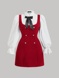 Front view of red plus size mini dress with white puff sleeves and black bow