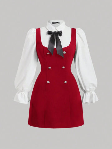 Front view of red plus size mini dress with white puff sleeves and black bow