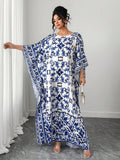 Escape the ordinary in this stunning batwing sleeve dress that celebrates timeless Chinoiserie artistry. Perfect for plus-size figures, the relaxed silhouette drapes beautifully while the dramatic sleeves add instant flair to your vacation wardrobe. The intricate print whispers stories of Eastern elegance, transforming any getaway into a fashion moment. Slip it on and let wanderlust do the talking—comfort meets style in the most effortless way possible.