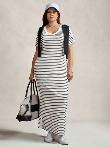 Step out in style and comfort with this playful plus size black and white striped maxi dress. Featuring a flattering V-neck and breezy short sleeves, it’s perfect for casual days or sporty adventures. The flowing design keeps you cool while the bold stripes add a fun, chic vibe to your everyday wear.