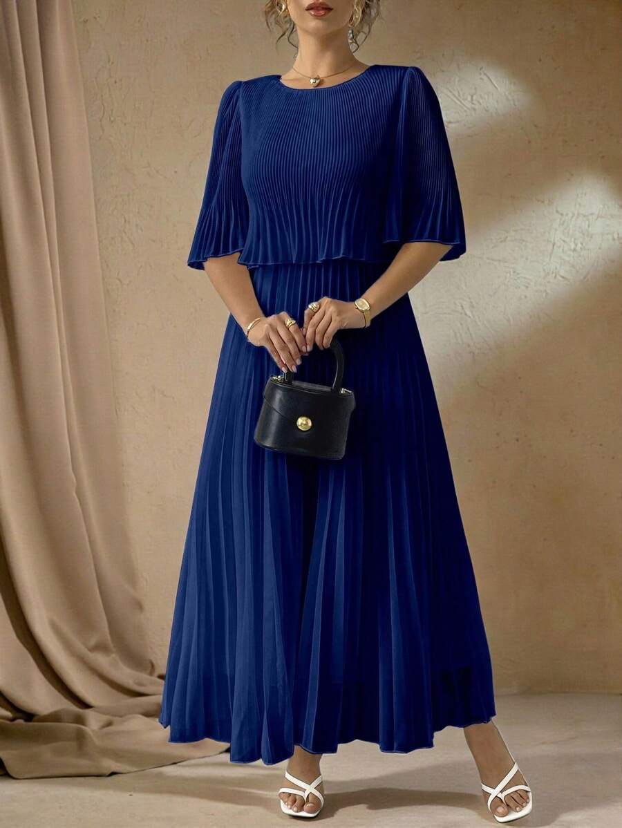 Elevate your warm-weather wardrobe with this stunning plus-size chiffon pleated dress that effortlessly transitions from brunch to evening plans. The flowing chiffon fabric drapes beautifully while the delicate pleats add dimension and movement, creating a silhouette that's both flattering and comfortable. Perfect for spring and summer occasions, this dress pairs timeless elegance with relaxed, approachable style. Whether you're dressing up for a special event or keeping it casual, this versatile piece beco