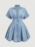 Front product view of light acid-wash denim mini dress with pleated hem
