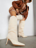 Elevate your style with our Chic Plus Size Fleece Mid-Calf High Heel Boots. Designed for everyday elegance, these boots offer a comfortable and stylish fit for any occasion. The fleece material provides an extra layer of warmth, making them perfect for colder weather. Achieve a chic and sophisticated look with these high heel boots.