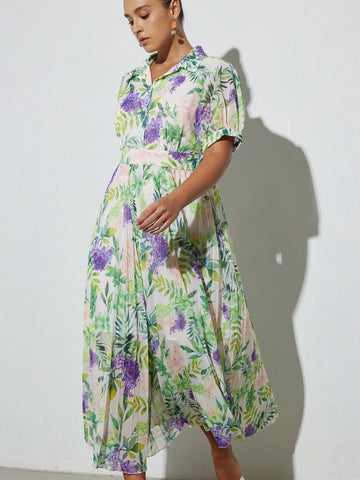 Step into spring and summer with this playful plus size mini dress, featuring a vibrant floral print that brightens any day. The puff sleeves add a touch of whimsy, while the ruffle hem brings flirty movement to your look. Perfect for sunny outings or casual gatherings, this dress combines comfort and style effortlessly. Embrace your curves and let your fun side bloom!