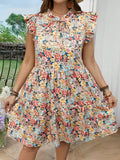 Bring a splash of sunshine to your getaway with this chic plus size floral print dress. Featuring a playful tie neck and flirty cap sleeves, it’s designed for easy, breezy vacation vibes. Comfortable and flattering, it’s your go-to for exploring new places or enjoying a sunset stroll in style. Embrace effortless chic wherever you go!