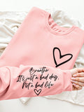 Stay stylish and cozy in this Chic Plus Size sweatshirt featuring a heart graphic and English letter print. Perfect for adding some personality to your wardrobe, this sweatshirt is made with soft fabric for ultimate comfort. Show off your love for fashion with this trendy piece!