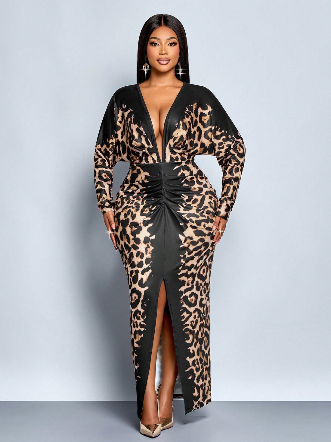 Embrace your wild side this season with our stunning leopard print maxi dress—the perfect blend of bold style and effortless elegance. The flattering deep V-neckline draws attention upward while the flowing batwing sleeves add a touch of drama and movement. Designed with plus-size curves in mind, this dress drapes beautifully and moves with you, making it ideal for everything from casual outings to special occasions. The timeless leopard pattern pairs seamlessly with your favorite boots or heels, ensuring y