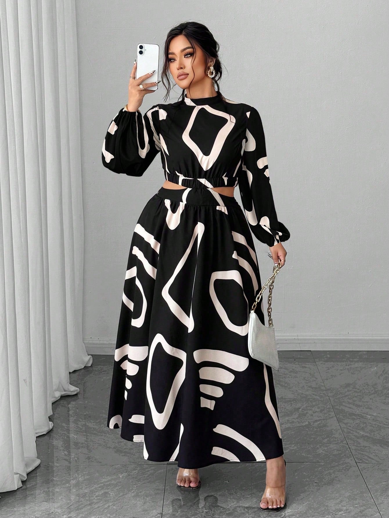 Elevate your everyday wardrobe with this stunning plus-size dress that effortlessly transitions from office to weekend plans. The long sleeves provide polished coverage while the strategic cutout at the waist creates a flattering silhouette that celebrates your curves. Crafted for comfort and style, this versatile piece pairs beautifully with sneakers for casual vibes or heels for a night out. Whether you're commuting to work or meeting friends for brunch, this dress delivers chic sophistication without the