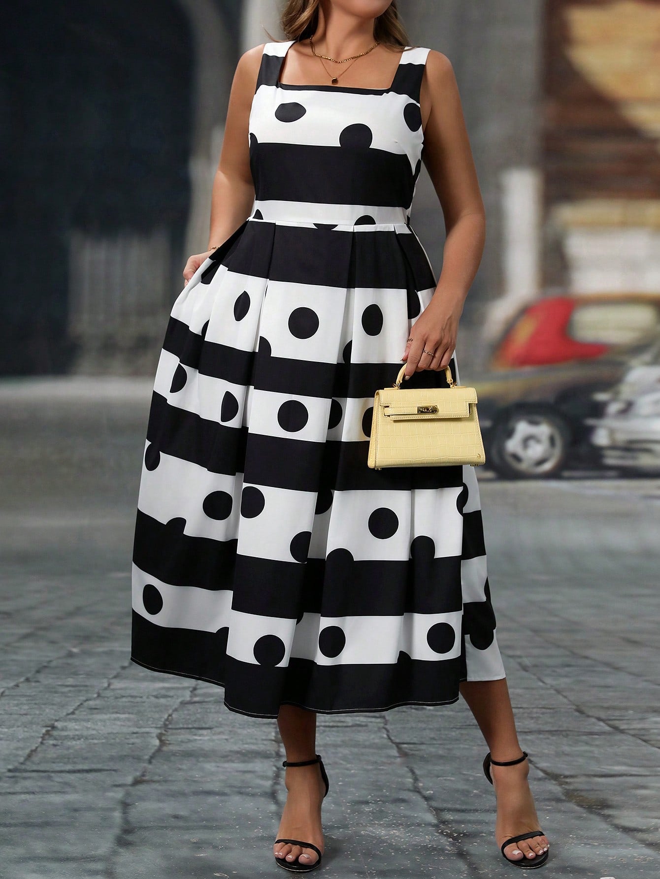 Effortlessly rock any occasion with this Chic Plus Size Polka Dot & Striped A-Line Dress. The playful polka dot and stripe pattern adds a touch of quirkiness to your style, while the A-line silhouette flatters your curves. Be ready to turn heads and receive compliments with this dress.