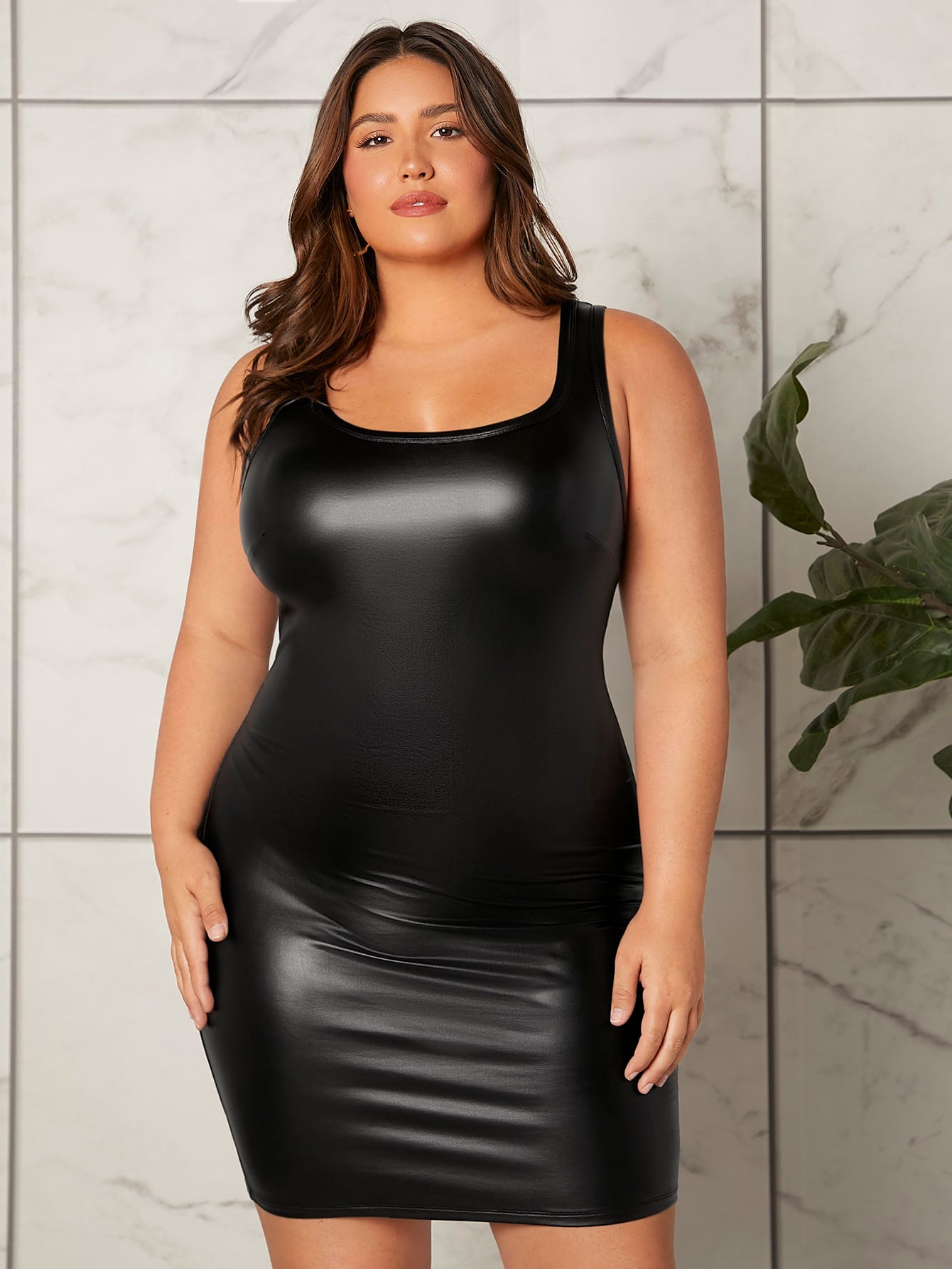Turn heads in this Chic Plus Size Scoop Neck PU Leather Bodycon Dress designed for fashion-forward trendsetters. Crafted to hug your curves with confidence, its sleek leather finish adds an edgy flair while the scoop neck offers a flirty touch. Perfect for nights out or stylish events, this dress blends comfort with bold style, making it a must-have for your statement wardrobe. Unleash your playful side and own every moment in this standout piece!