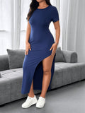 Stay stylishly comfortable in this plus size casual dress with a round neck and slit short sleeves. Perfect for any occasion, this chic dress will have you looking and feeling your best all day long. The solid color adds a touch of elegance, making it a must-have addition to your wardrobe.